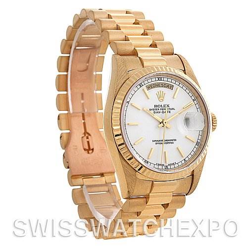 This image shows a Rolex President 18238 Men's Yellow Gold White Dial 18238 Men's Yellow Gold White Dial model watch at an oblique angle, highlighting the bracelet, case, and dial.