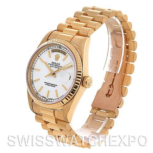 The Rolex President 18238 Men's Yellow Gold White Dial 18238 Men's Yellow Gold White Dial model watch is shown at a three-quarter angle, detailing the dial, bezel, crown, and bracelet.