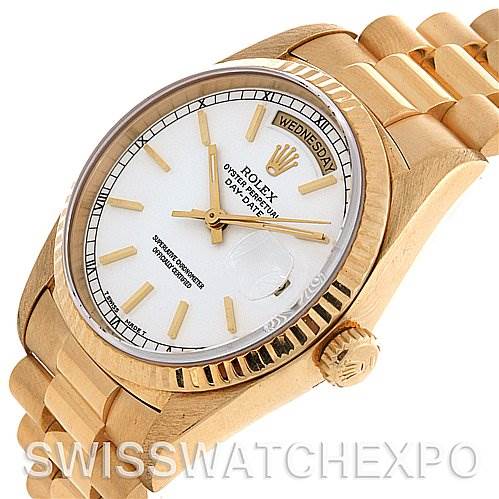 The image shows a Rolex President 18238 Men's Yellow Gold White Dial 18238 Men's Yellow Gold White Dial model watch at a three-quarter angle, highlighting the dial, bezel, crown, and part of the bracelet.