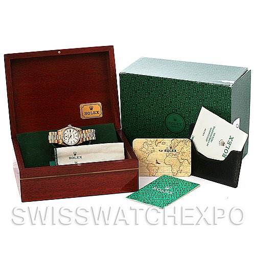 The image shows a Rolex President 18238 Men's Yellow Gold White Dial 18238 Men's Yellow Gold White Dial model watch in an open box, alongside its outer box, booklets, and documentation.