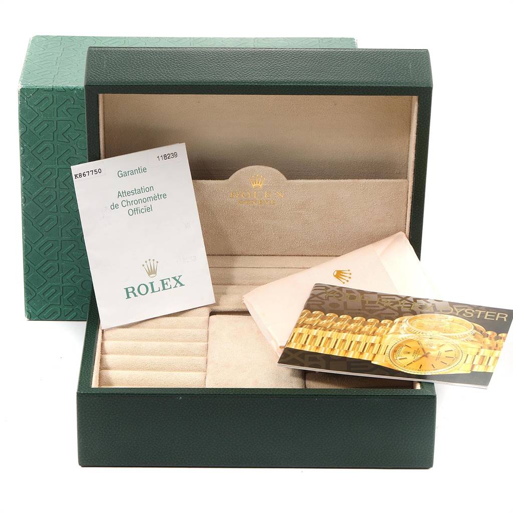 This image shows the packaging, warranty card, and manual for the Rolex President 118239 Men's White Gold Silver Dial 118239 Men's White Gold Silver Dial model, viewed from the front.