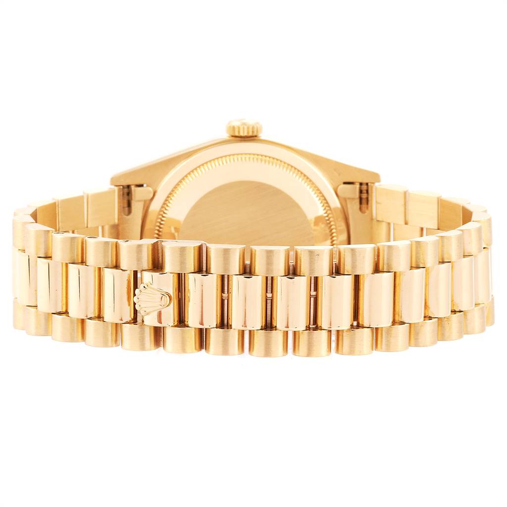 This image shows the back of a Rolex President 18238 Men
s Yellow Gold Champagne Dial 18238 Men
s Yellow Gold Champagne Dial model watch, displaying its gold case and bracelet.