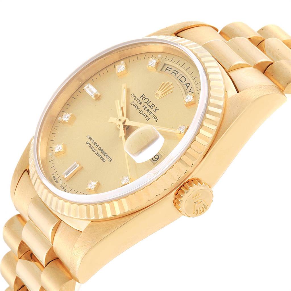 This image of the Rolex President 18238 Men
s Yellow Gold Champagne Dial 18238 Men
s Yellow Gold Champagne Dial model watch is taken from an angle showing the dial, bezel, crown, and part of the bracelet.