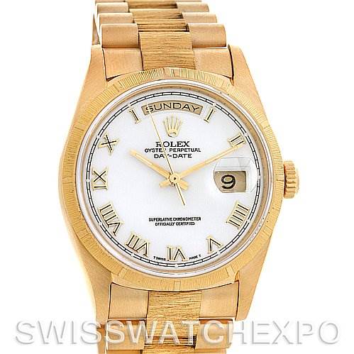 This image shows a front view of the Rolex President 18248 Men's Yellow Gold White Dial 18248 Men's Yellow Gold White Dial watch, displaying its dial, hands, day-date feature, and part of the bracelet.