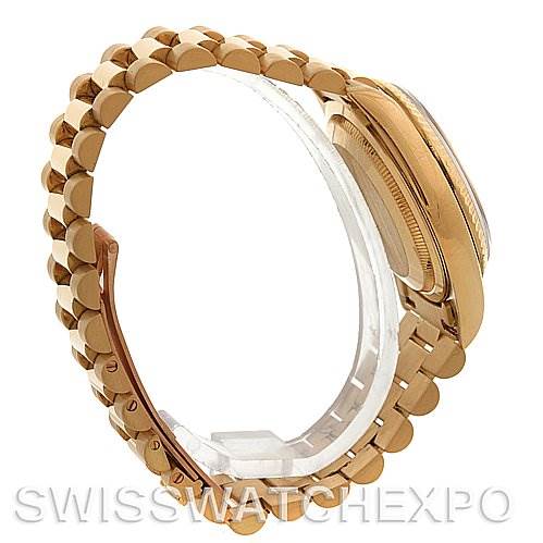 The image shows a side profile of a Rolex President 18238 Men's Yellow Gold Blue Dial 18238 Men's Yellow Gold Blue Dial model, highlighting the bracelet and part of the watch case.