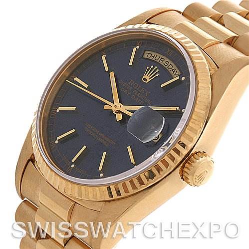 The image shows a Rolex President 18238 Men's Yellow Gold Blue Dial 18238 Men's Yellow Gold Blue Dial model watch at an angled side view with a clear display of the dial, bezel, crown, and bracelet.