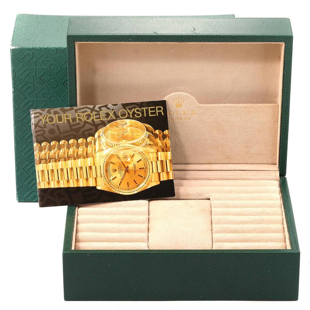 The image shows a Rolex President 18388 Men's Yellow Gold White Dial 18388 Men's Yellow Gold White Dial model watch box, packaging, and a booklet with the watch displayed on it.