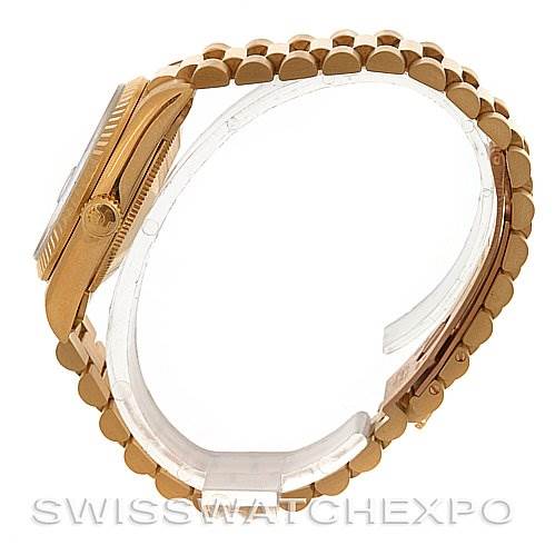 The image shows a side view of a Rolex President 68278 Yellow Gold Mother of Pearl Dial 68278 Yellow Gold Mother of Pearl Dial model, highlighting the case, crown, and part of the bracelet.