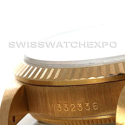 This image shows a close-up side view of the case and bezel of a Rolex President 68278 Yellow Gold Mother of Pearl Dial 68278 Yellow Gold Mother of Pearl Dial model watch, displaying its serial number.