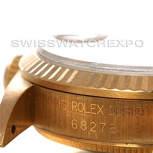 This image shows the side view of a Rolex President 68278 Yellow Gold Mother of Pearl Dial 68278 Yellow Gold Mother of Pearl Dial model, focusing on the case with visible engravings and part of the bezel.