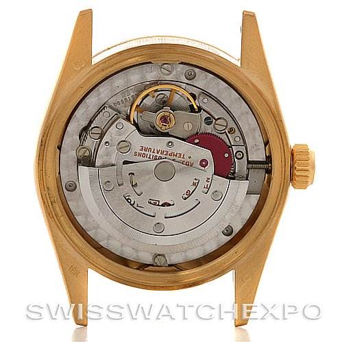 The image shows the back view of a Rolex President 68278 Yellow Gold Mother of Pearl Dial 68278 Yellow Gold Mother of Pearl Dial model, highlighting the internal movement and mechanism.