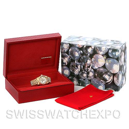 The image shows a Rolex President 68278 Yellow Gold Mother of Pearl Dial 68278 Yellow Gold Mother of Pearl Dial watch in its red box, with an additional decorative box and red pouch.