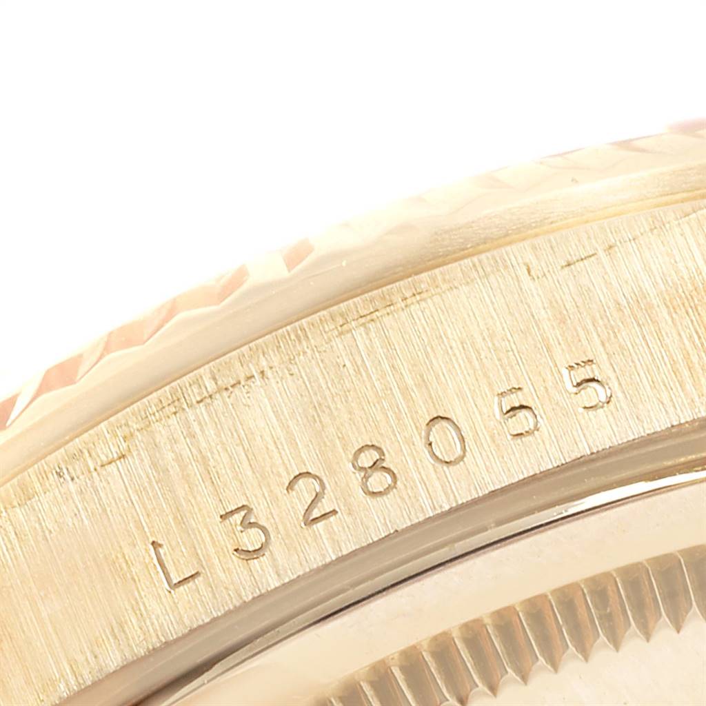 This close-up image shows the serial number engraved on the side of the Rolex President 18238 Men
s Yellow Gold Champagne Dial 18238 Men
s Yellow Gold Champagne Dial watch case.