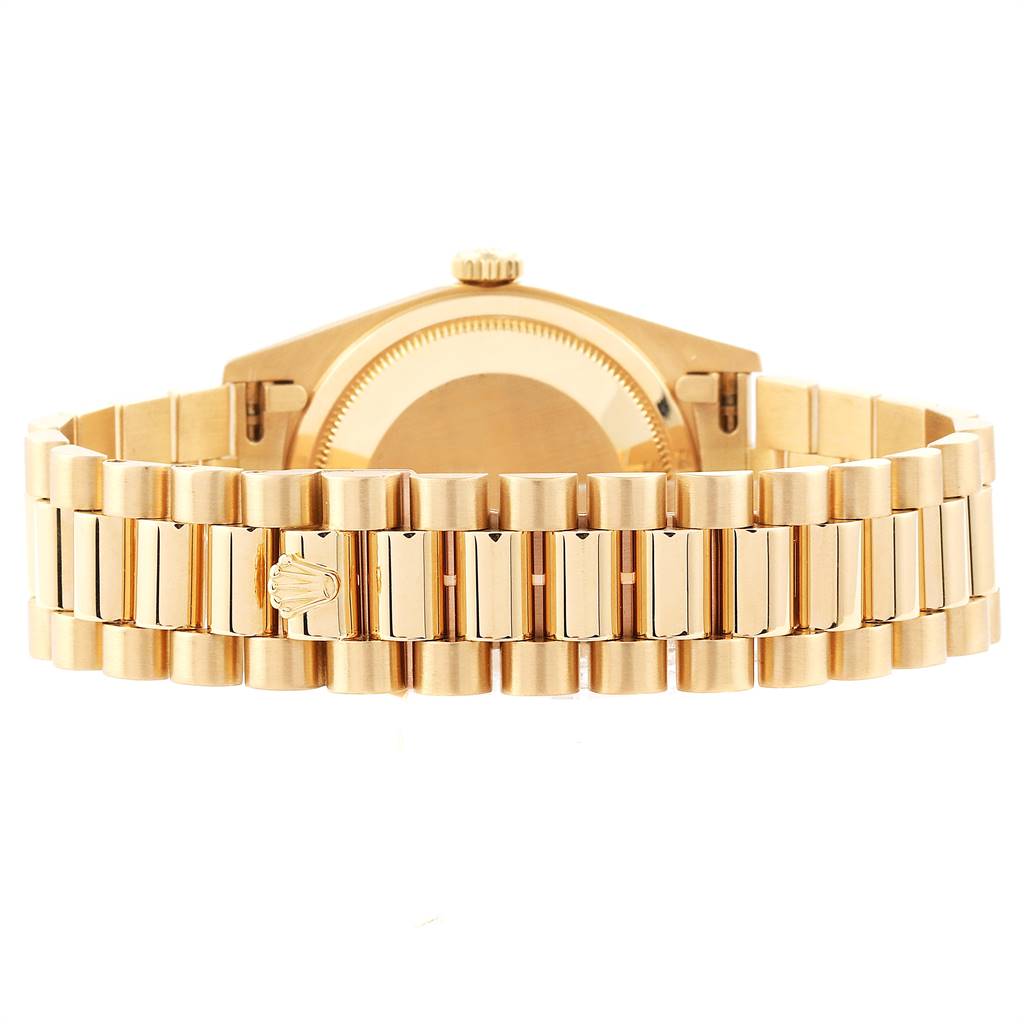 The image shows the bracelet and clasp of the Rolex President 18238 Men
s Yellow Gold Champagne Dial 18238 Men
s Yellow Gold Champagne Dial model watch from a rear angle.
