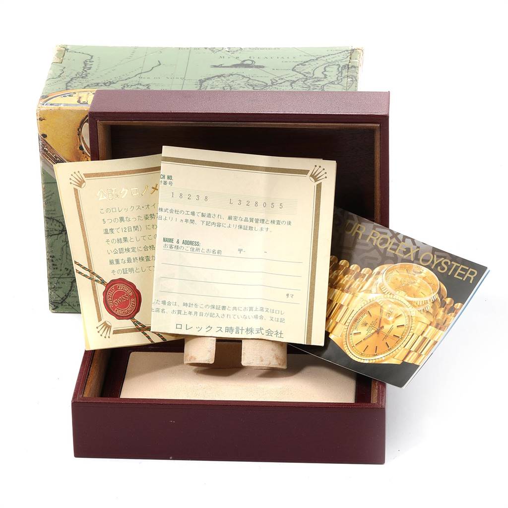 The image shows the packaging, warranty cards, and brochure for a Rolex President 18238 Men
s Yellow Gold Champagne Dial 18238 Men
s Yellow Gold Champagne Dial model watch.