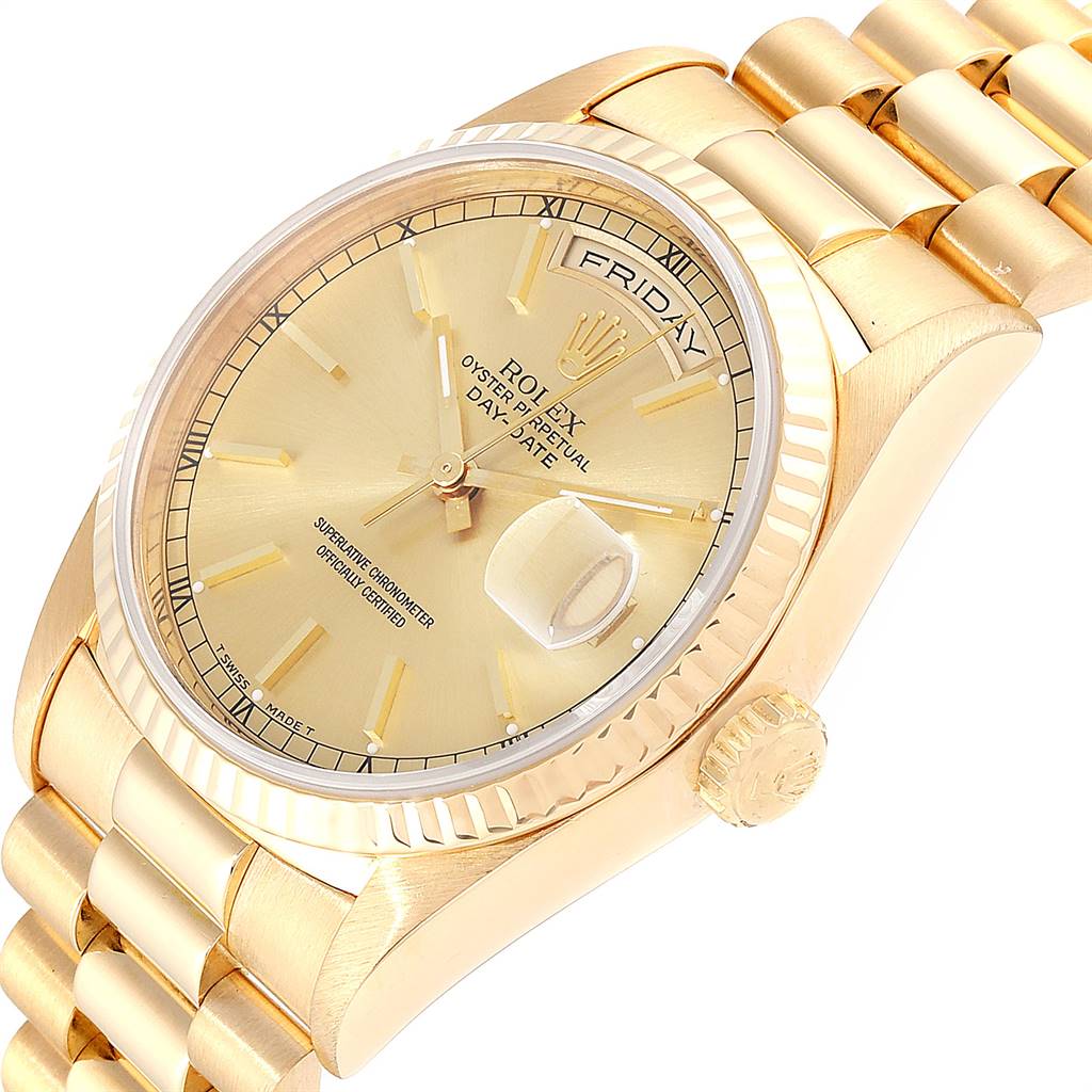 This image shows a close-up of the Rolex President 18238 Men
s Yellow Gold Champagne Dial 18238 Men
s Yellow Gold Champagne Dial model with a focus on the dial, crown, and part of the bracelet.
