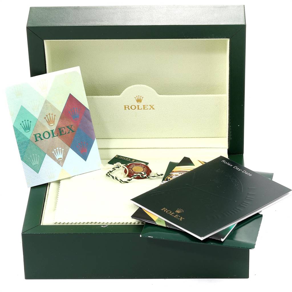 The image shows a Rolex President 118338 Men
s Yellow Gold Silver Dial 118338 Men
s Yellow Gold Silver Dial model watch box with booklets, tags, and warranty card.