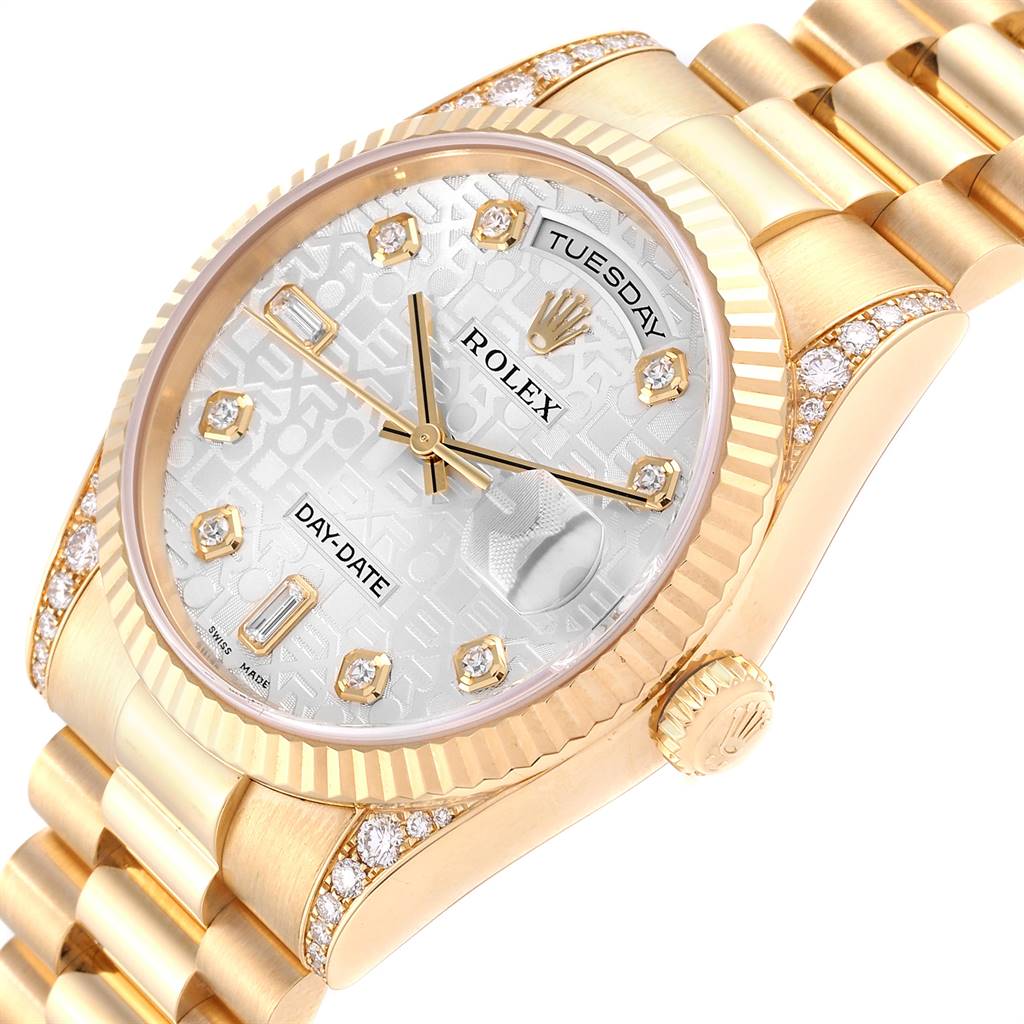 This image shows a close-up of the Rolex President 118338 Men
s Yellow Gold Silver Dial 118338 Men
s Yellow Gold Silver Dial model watch, highlighting the dial, bezel, and part of the bracelet.