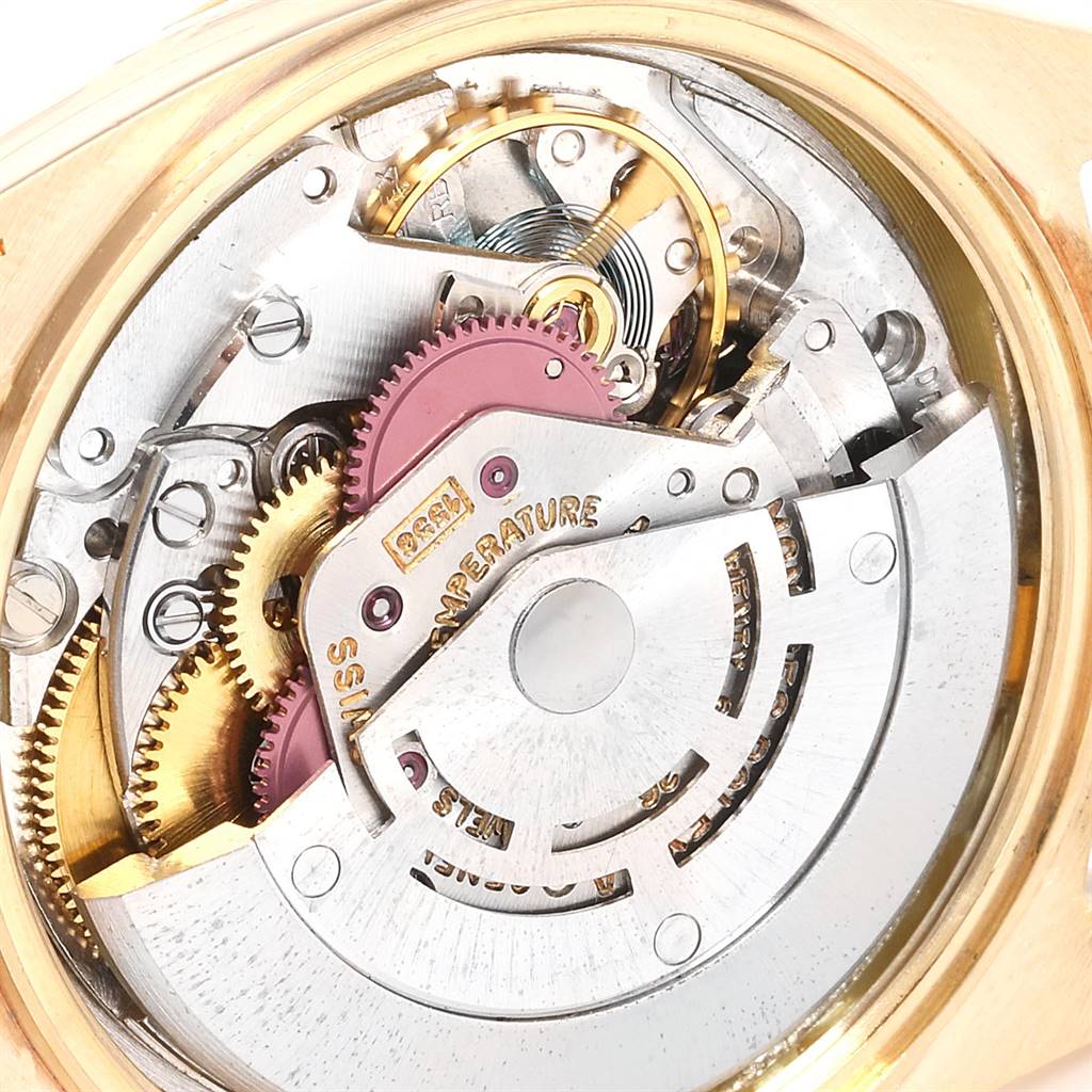 The image shows a close-up of the internal mechanism of the Rolex President 1803 Men's Yellow Gold Champagne Dial 1803 Men's Yellow Gold Champagne Dial model watch from the back angle.