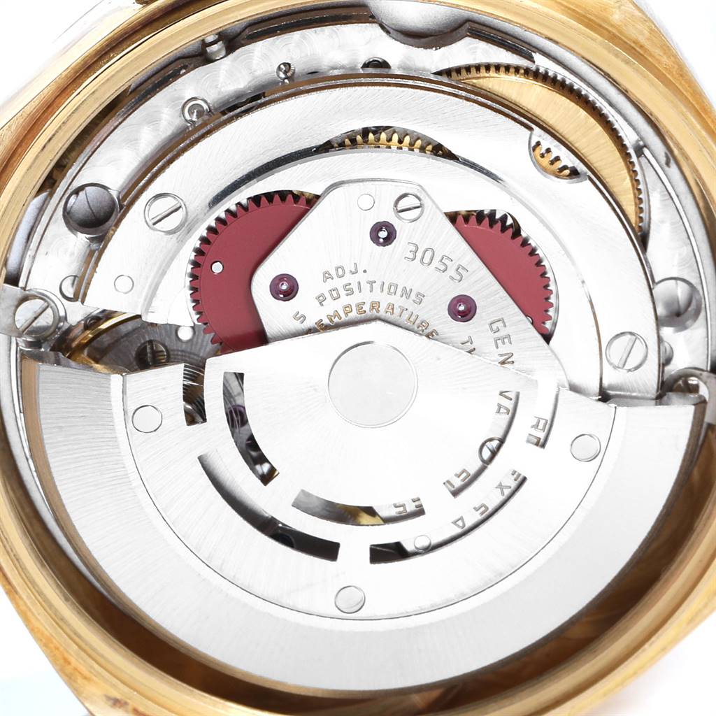 This is a close-up view of the inner mechanical movement of a Rolex President 18078 Men's Yellow Gold Black Dial 18078 Men's Yellow Gold Black Dial model watch.