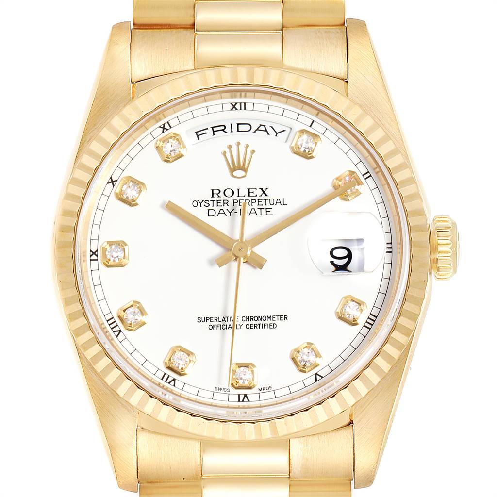 The image shows a frontal view of a Rolex President 18238 Men's Yellow Gold White Dial 18238 Men's Yellow Gold White Dial model watch, highlighting the dial, bezel, and part of the bracelet.