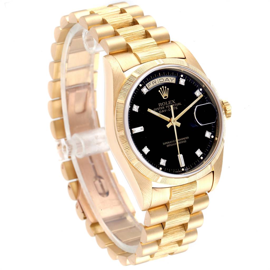 The image shows a side-front angle of a Rolex President 18248 Men's Yellow Gold Black Dial 18248 Men's Yellow Gold Black Dial model watch, highlighting its gold band, black dial, and day-date display.