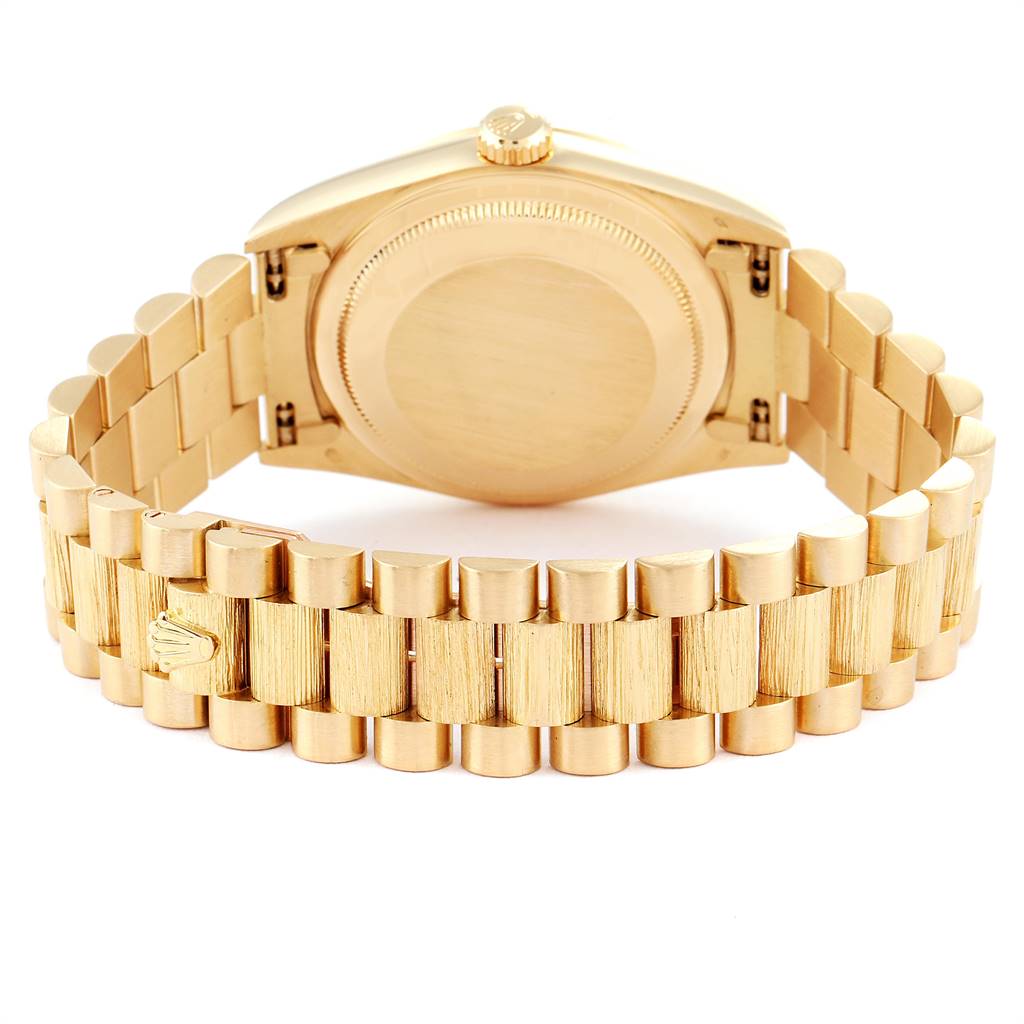 The image shows the back view of the Rolex President 18248 Men's Yellow Gold Black Dial 18248 Men's Yellow Gold Black Dial model watch, highlighting its bracelet and clasp.