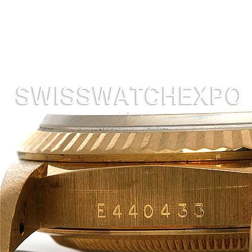 This image shows a side view of the Rolex President 18238 Men's Yellow Gold Champagne Dial 18238 Men's Yellow Gold Champagne Dial model watch, focusing on the fluted bezel and part of the engraved case.