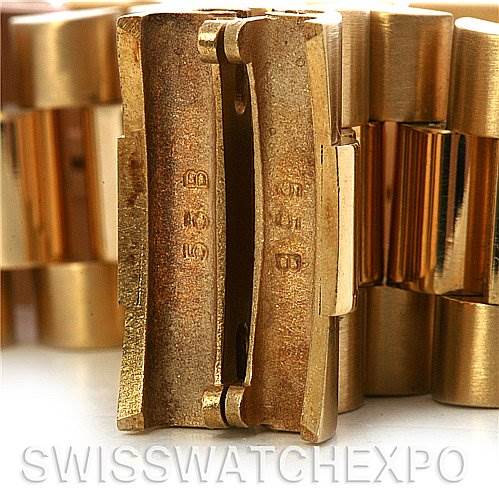 This close-up image shows the clasp mechanism and links of a Rolex President 18238 Men's Yellow Gold Champagne Dial 18238 Men's Yellow Gold Champagne Dial watch.