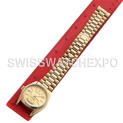 The image shows a Rolex President 18238 Men's Yellow Gold Champagne Dial 18238 Men's Yellow Gold Champagne Dial model watch laid flat with its dial and bracelet visible, aligned next to a red ruler for measurement.