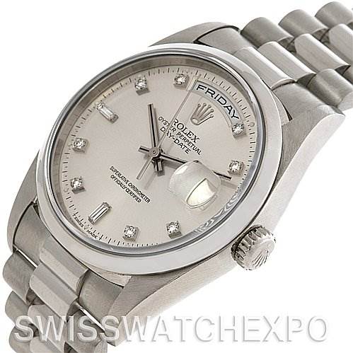The Rolex President 18206 Men's Platinum Silver Dial 18206 Men's Platinum Silver Dial model watch is shown at a slight angle, revealing its face, crown, bracelet, and day-date features.