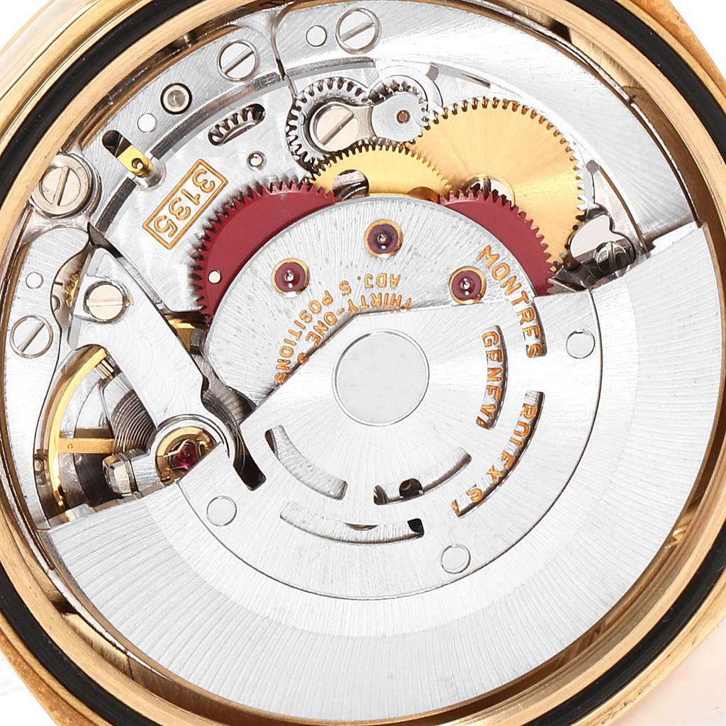 This image shows the intricate internal mechanism and movement parts of a Rolex President 16238 Men
s Yellow Gold Champagne Dial 16238 Men
s Yellow Gold Champagne Dial watch.