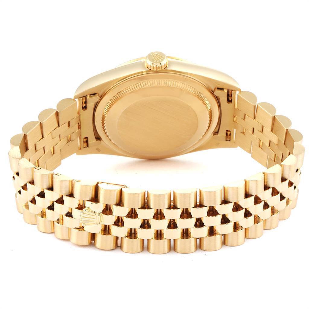 The image shows the back and band of a Rolex President 16238 Men
s Yellow Gold Champagne Dial 16238 Men
s Yellow Gold Champagne Dial model watch from a rear angle.