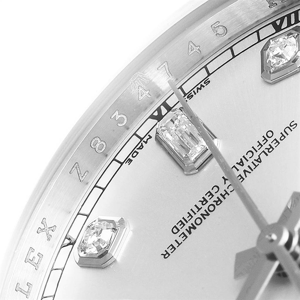 This close-up image of a Rolex President 118296 Men's Platinum Silver Dial 118296 Men's Platinum Silver Dial model shows the dial with diamond hour markers and part of the branding text.