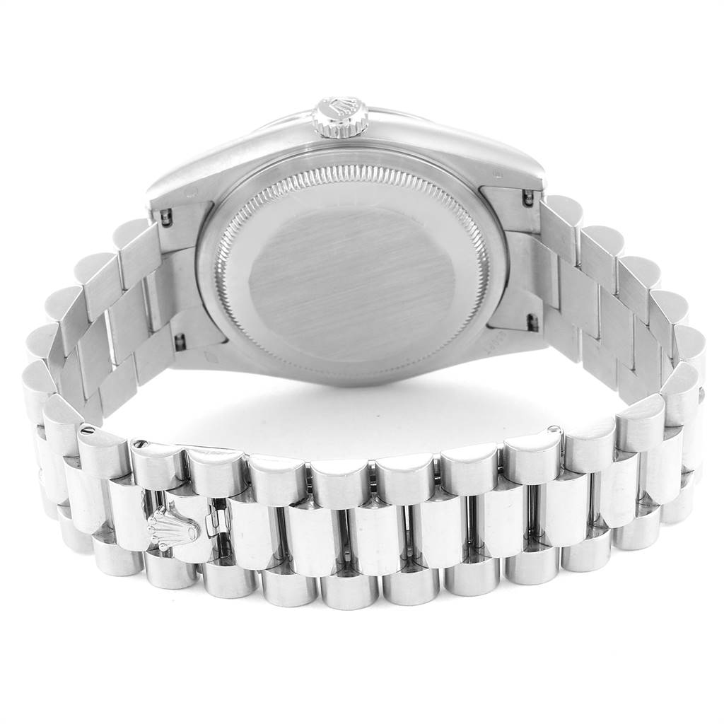 The image shows the back case and bracelet of a Rolex President 118296 Men's Platinum Silver Dial 118296 Men's Platinum Silver Dial model watch.