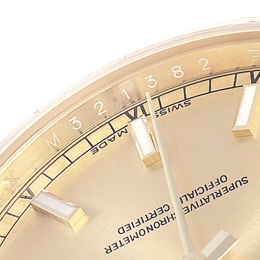 This image shows a close-up of the dial and indices of a Rolex President 118238 Men
s Yellow Gold Champagne Dial 118238 Men
s Yellow Gold Champagne Dial model watch, focusing on the upper section.