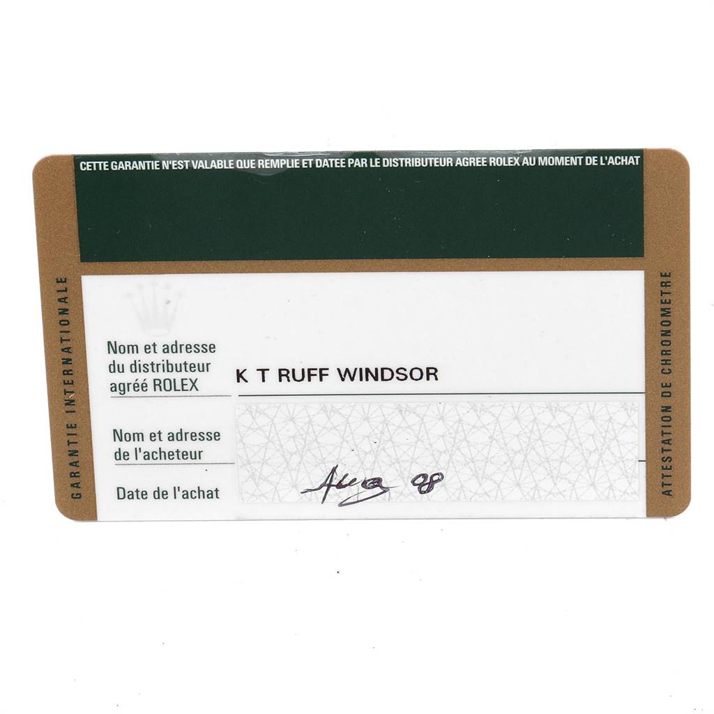 This image shows a close-up of the warranty card for a Rolex President 118238 Men
s Yellow Gold Champagne Dial 118238 Men
s Yellow Gold Champagne Dial model watch.