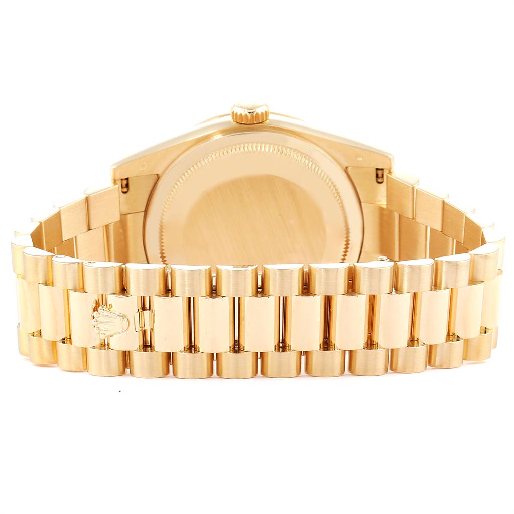 This image shows the back view of a Rolex President 118238 Men
s Yellow Gold Champagne Dial 118238 Men
s Yellow Gold Champagne Dial model watch, highlighting the case back and bracelet.