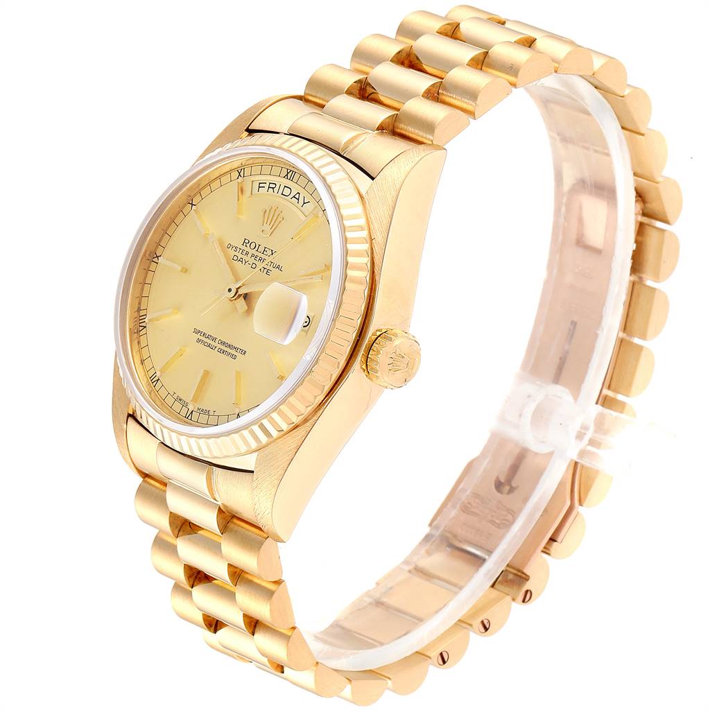 This image shows a Rolex President 18038 Men
s Yellow Gold Champagne Dial 18038 Men
s Yellow Gold Champagne Dial model watch from an angled side view, displaying the dial, fluted bezel, and gold bracelet.