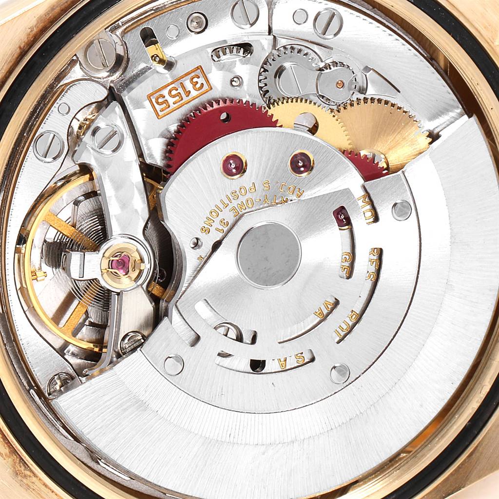 The image shows a close-up of the movement mechanism inside a Rolex President 18238 Men
s Yellow Gold Mother of Pearl Dial 18238 Men
s Yellow Gold Mother of Pearl Dial model watch.