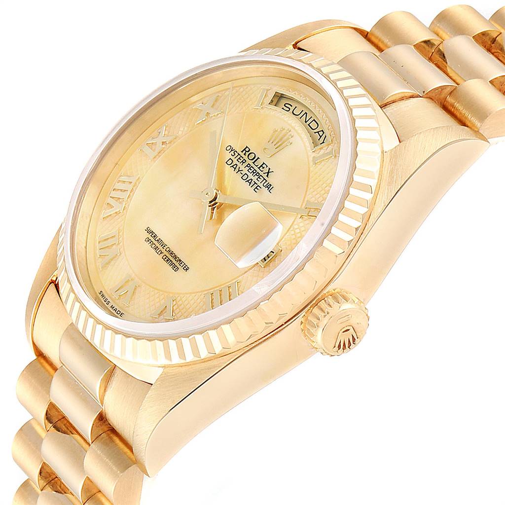 The Rolex President 18238 Men
s Yellow Gold Mother of Pearl Dial 18238 Men
s Yellow Gold Mother of Pearl Dial model watch is shown at an angle highlighting the dial, bezel, crown, and part of the bracelet.