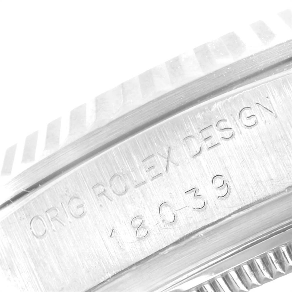 The image shows a close-up of the side of a Rolex President 18039 Men
s White Gold Silver Dial 18039 Men
s White Gold Silver Dial model watch, highlighting the model number engraving.