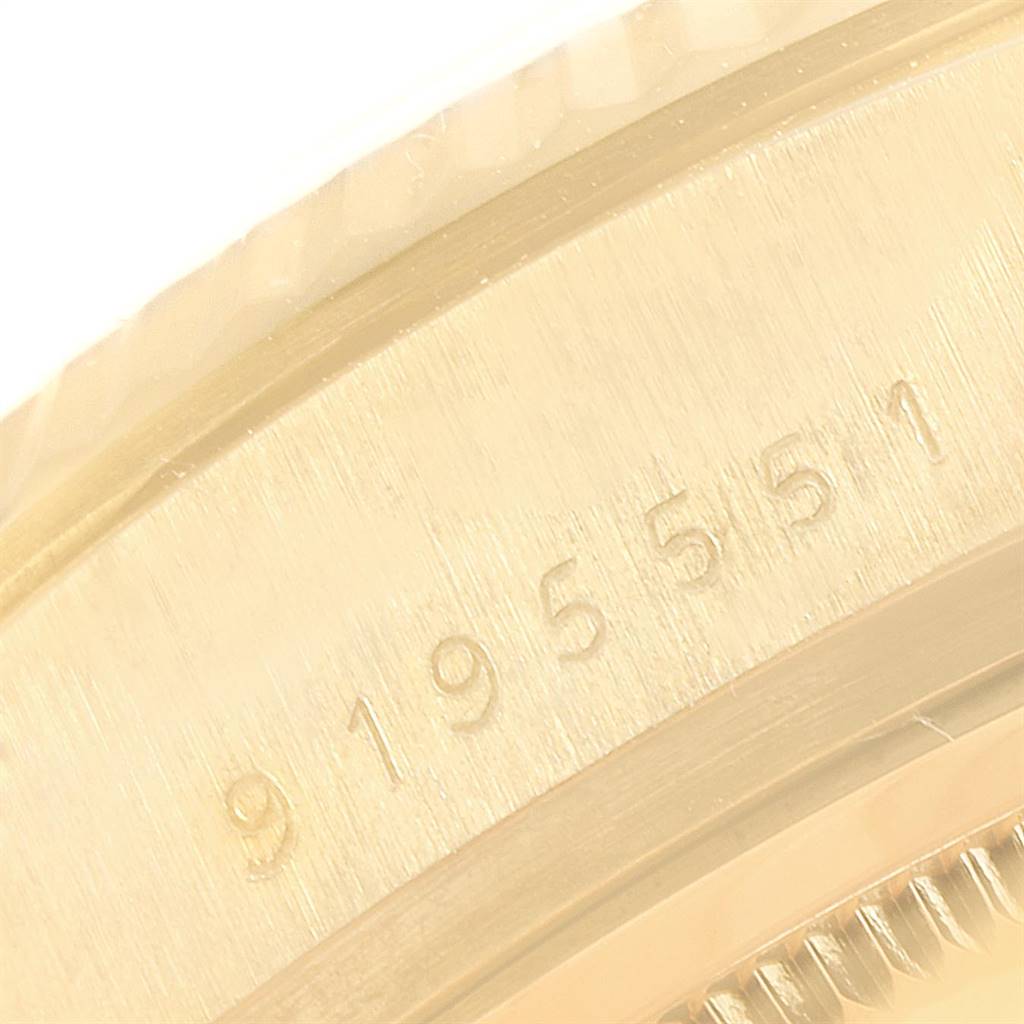 This is a close-up angle showing the serial number on the case of a Rolex President 18038 Men
s Yellow Gold Champagne Dial 18038 Men
s Yellow Gold Champagne Dial model watch.