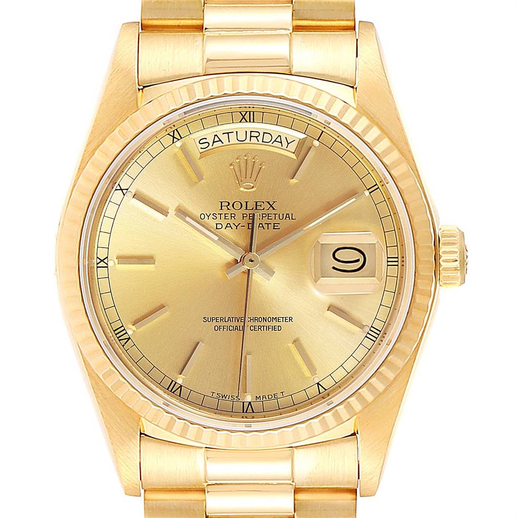 The image shows a close-up of the dial, bezel, and part of the bracelet of a Rolex President 18038 Men
s Yellow Gold Champagne Dial 18038 Men
s Yellow Gold Champagne Dial model watch.