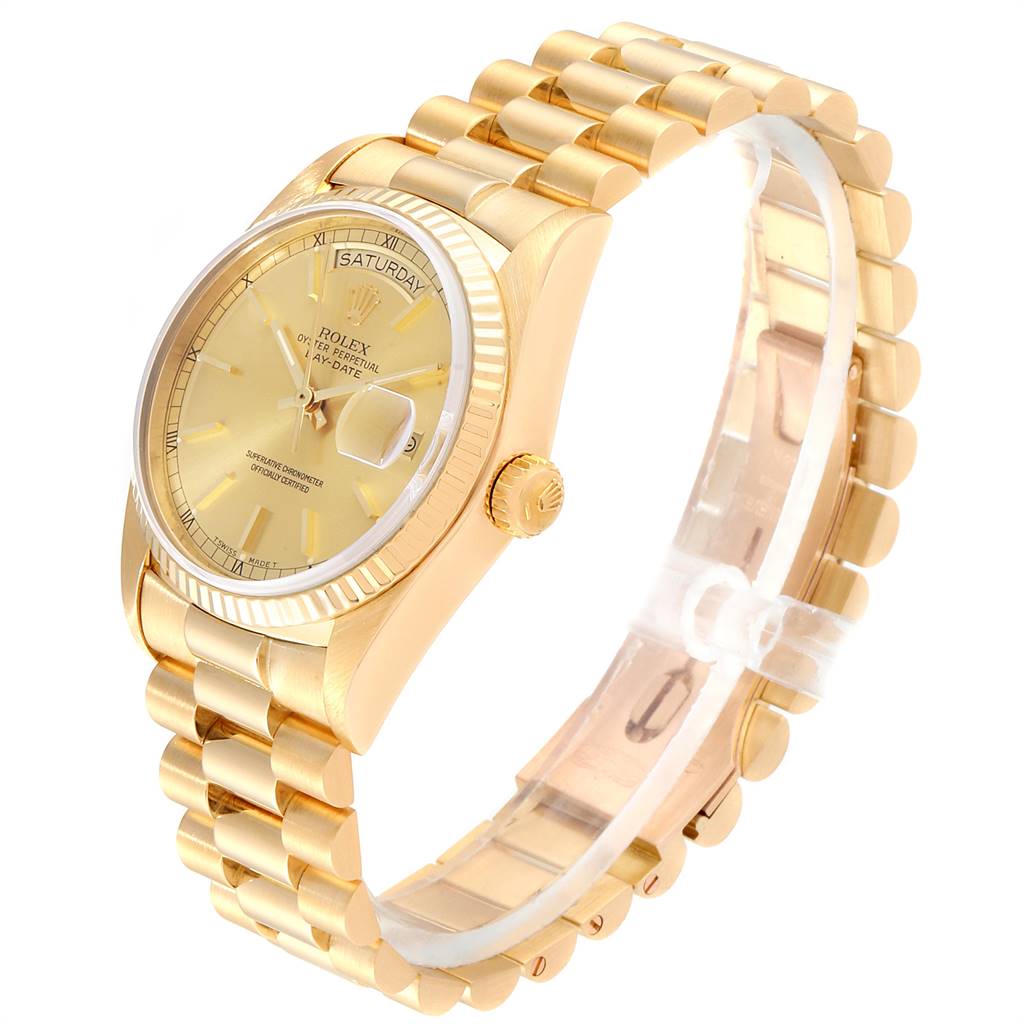 The image shows a Rolex President 18038 Men
s Yellow Gold Champagne Dial 18038 Men
s Yellow Gold Champagne Dial model watch from an angle highlighting the face, crown, and bracelet.