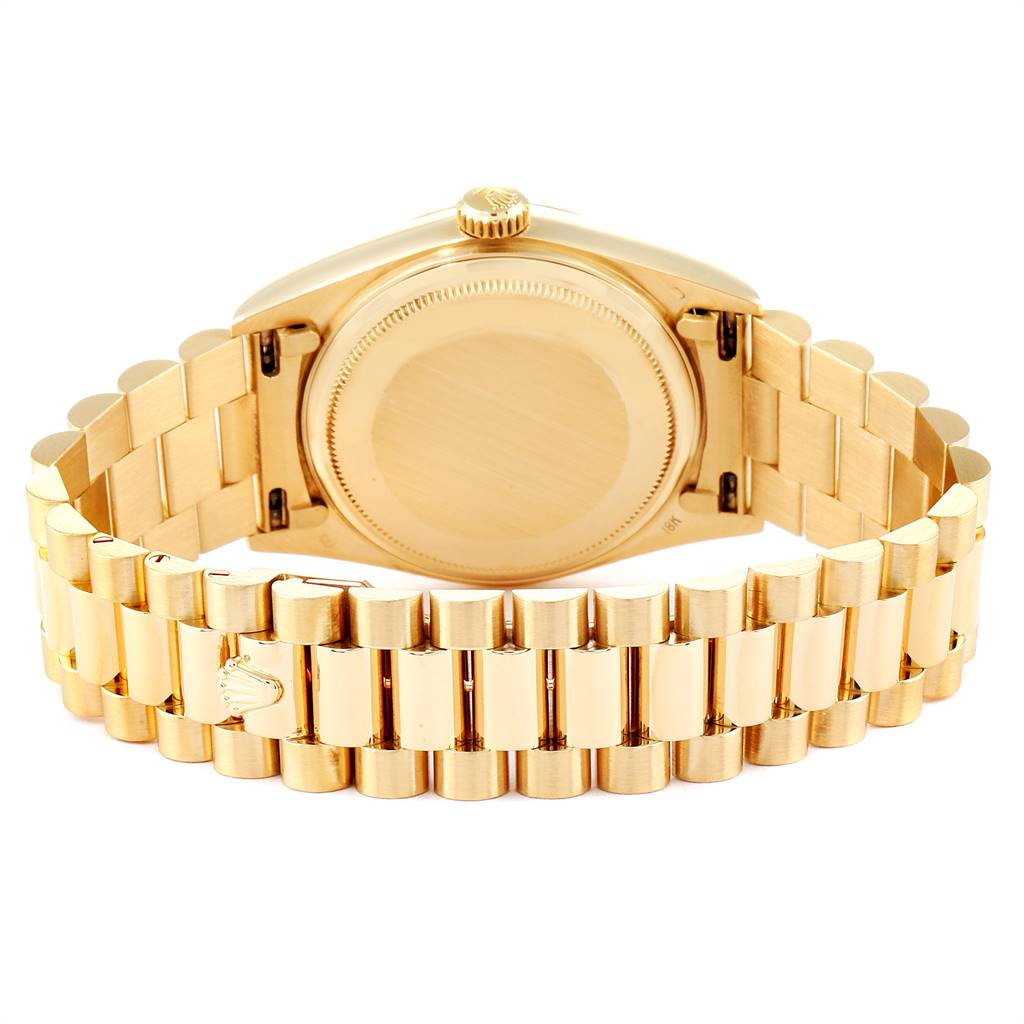 This image shows the back view of the Rolex President 18038 Men
s Yellow Gold Champagne Dial 18038 Men
s Yellow Gold Champagne Dial model watch, highlighting the bracelet, clasp, and case back.