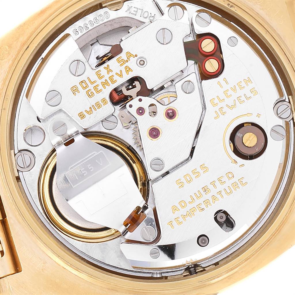 Close-up view of the movement inside a Rolex President 19018 Men
s Yellow Gold Black Dial 19018 Men
s Yellow Gold Black Dial model watch, showcasing its mechanical components and engravings.
