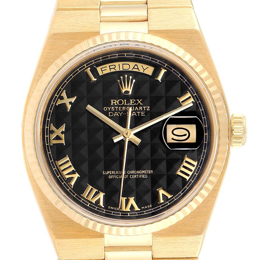 The image shows the front face of the Rolex Oysterquartz Day-Date President watch, highlighting the dial, bezel, crown, and bracelet.