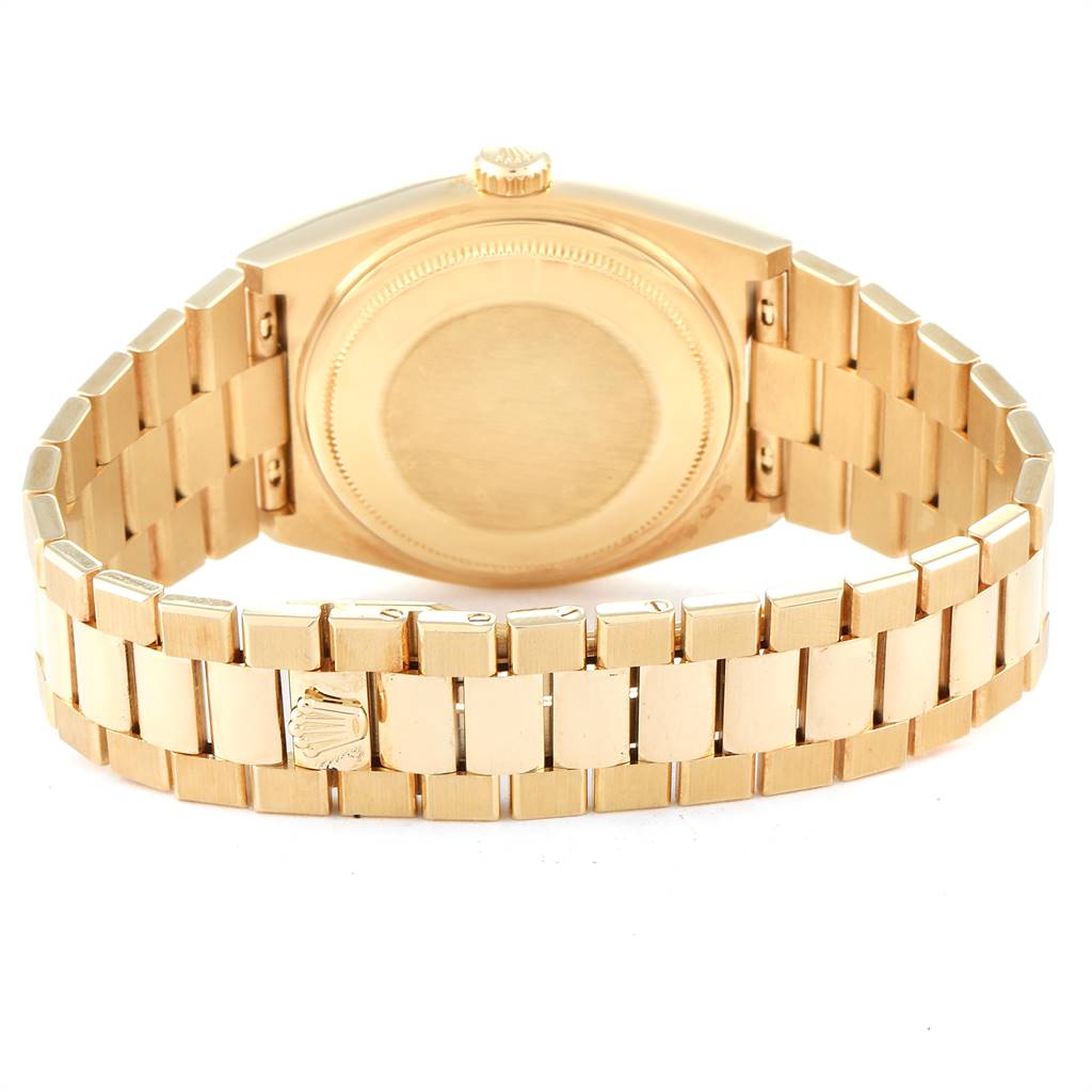 The image displays the back view and bracelet of a Rolex President 19018 Men
s Yellow Gold Black Dial 19018 Men
s Yellow Gold Black Dial model watch.