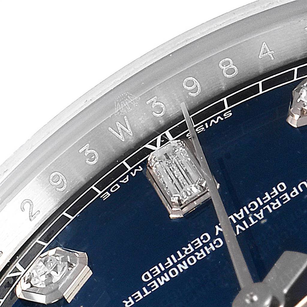 The image shows a close-up of the dial and bezel of a Rolex President 118239 Men's White Gold Blue Dial 118239 Men's White Gold Blue Dial watch, highlighting the hour markers and numbers.